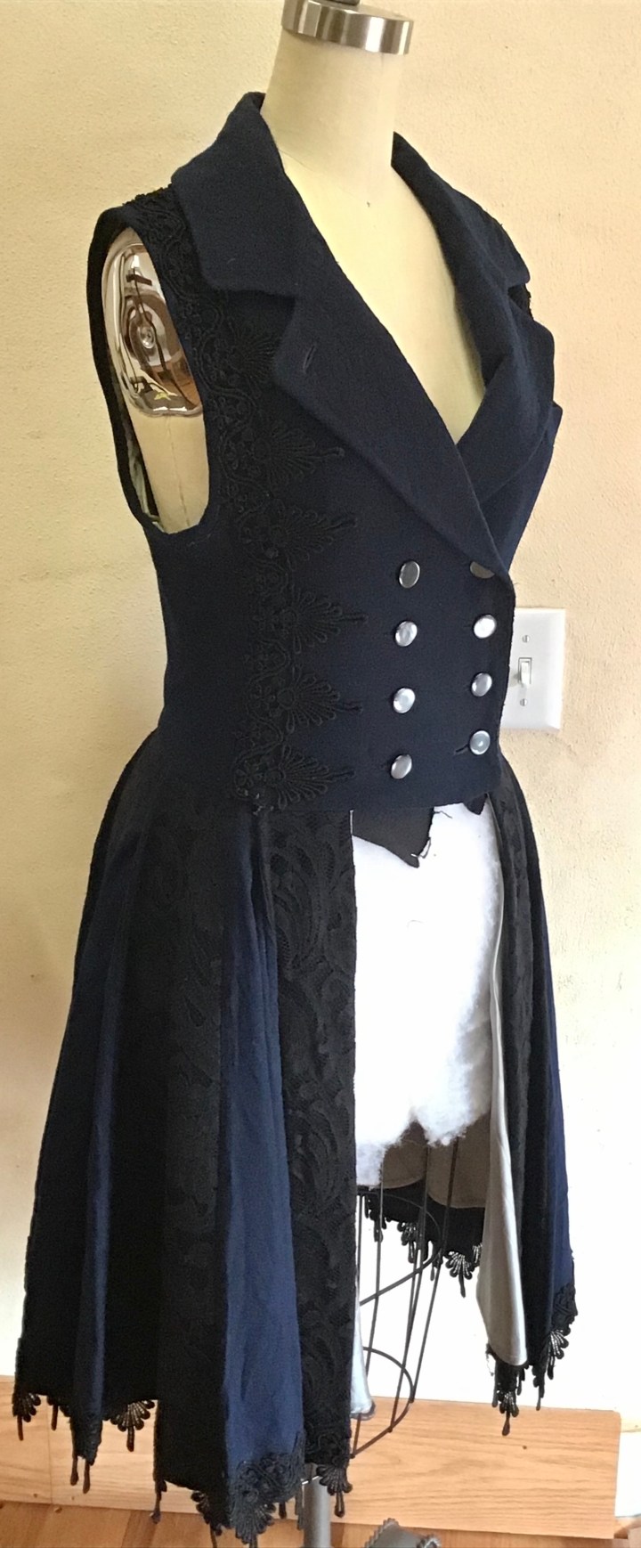 Sleeveless frock coats